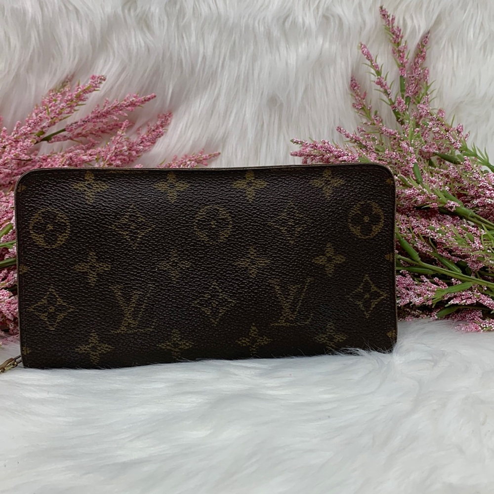 043 Authentic Louis Vuitton Monogram Porte Monnaie Zip Wallet Datecode: CA0020